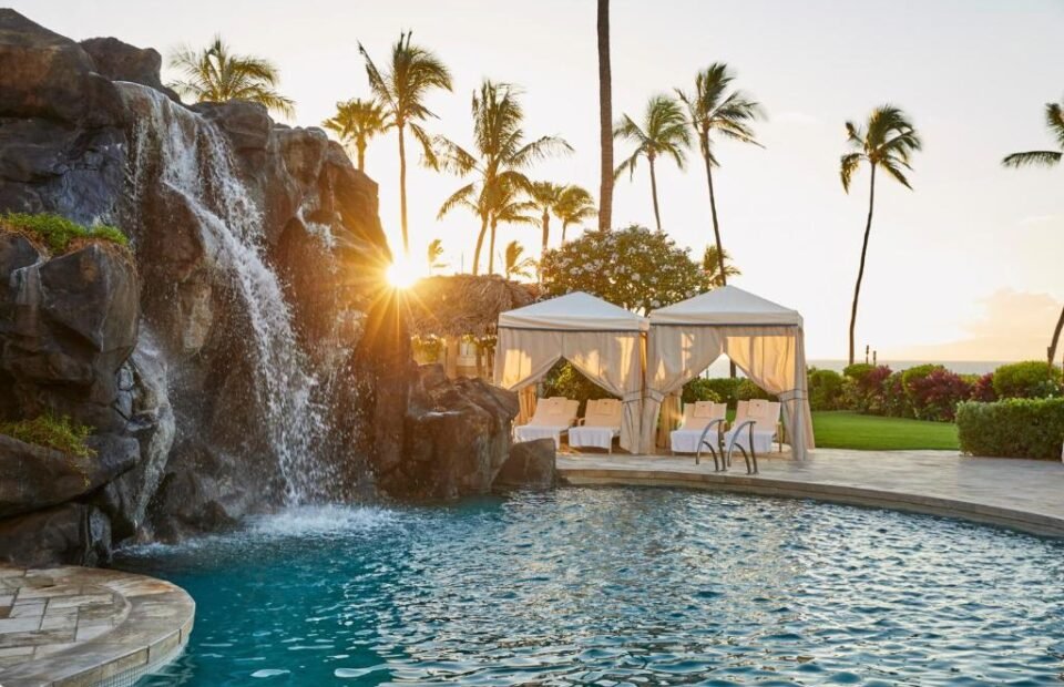 Waterfall pool and private cabanas at Four Seasons Resort Maui at Wailea