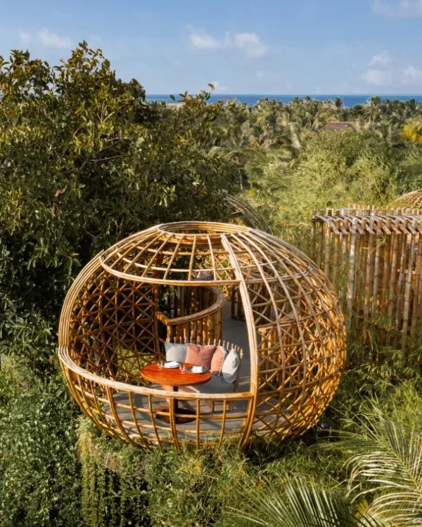 Elevated bamboo dining pod at Terra restaurant at Waldorf Astoria Maldives Ithaafushi