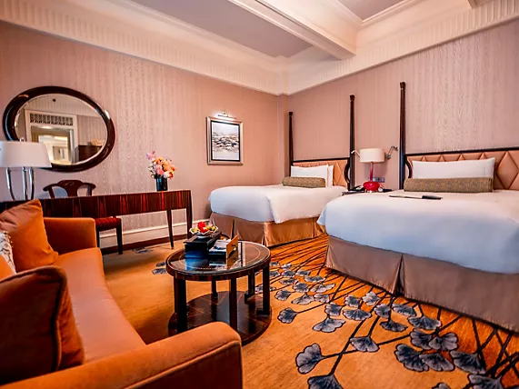 Luxury guest room at Fairmont Peace Hotel overlooking the Bund in Shanghai, China