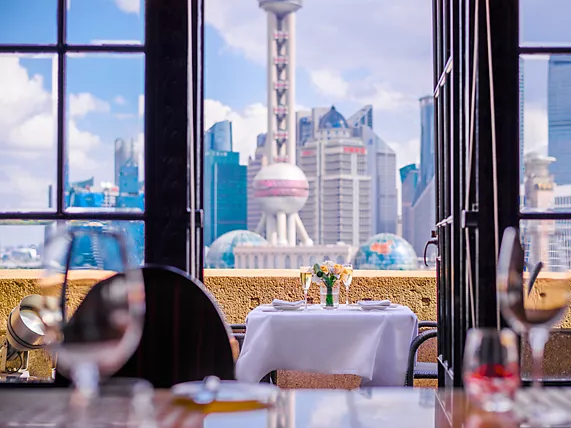Fine dining with Pudong skyline views at Fairmont Peace Hotel in Shanghai, China