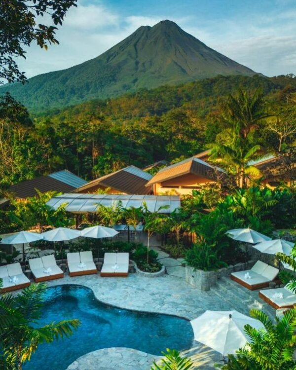 Infinity pool with Arenal Volcano views at Nayara Gardens luxury resort in Costa Rica