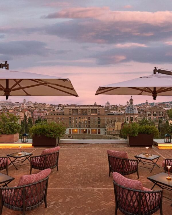 Rooftop terrace with panoramic Rome skyline views at Bulgari Hotel Roma
