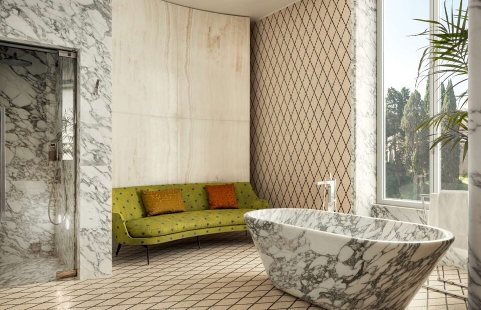 Luxury marble bathroom with freestanding bathtub at Bulgari Hotel Roma