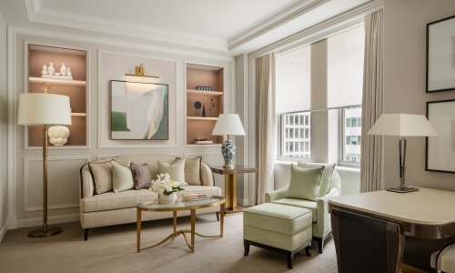 Junior Suite living area at the Waldorf Astoria New York with elegant Art Deco design