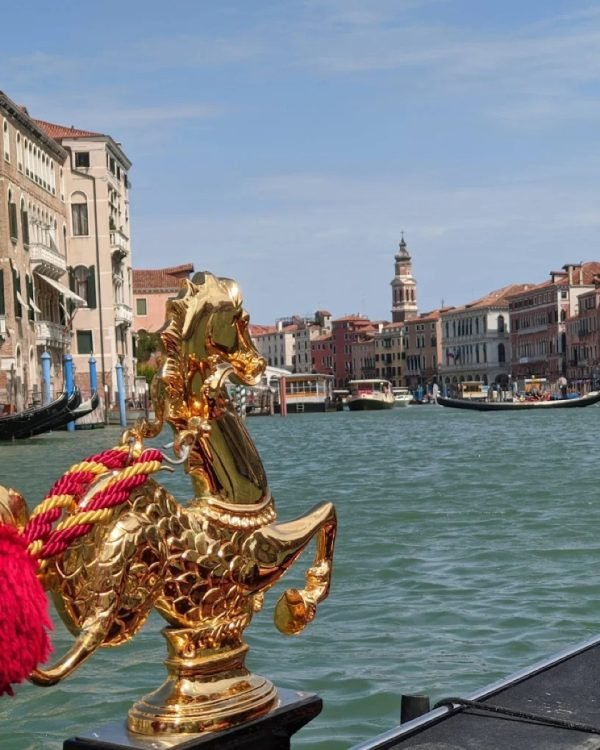 Gilded gondola ornament on the Grand Canal, Venice