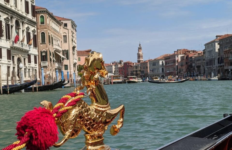 Gilded gondola ornament on the Grand Canal, Venice