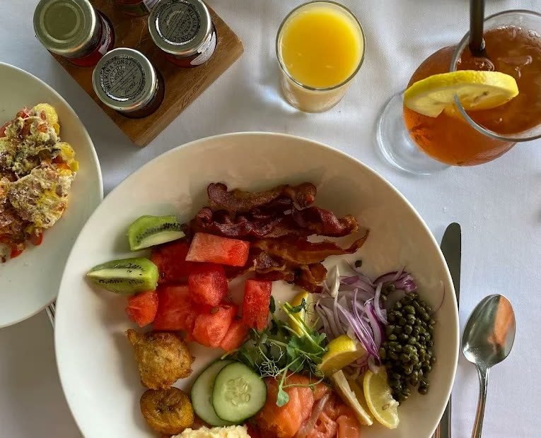 Breakfast spread with juices and fruit at Fairmont Royal Pavilion