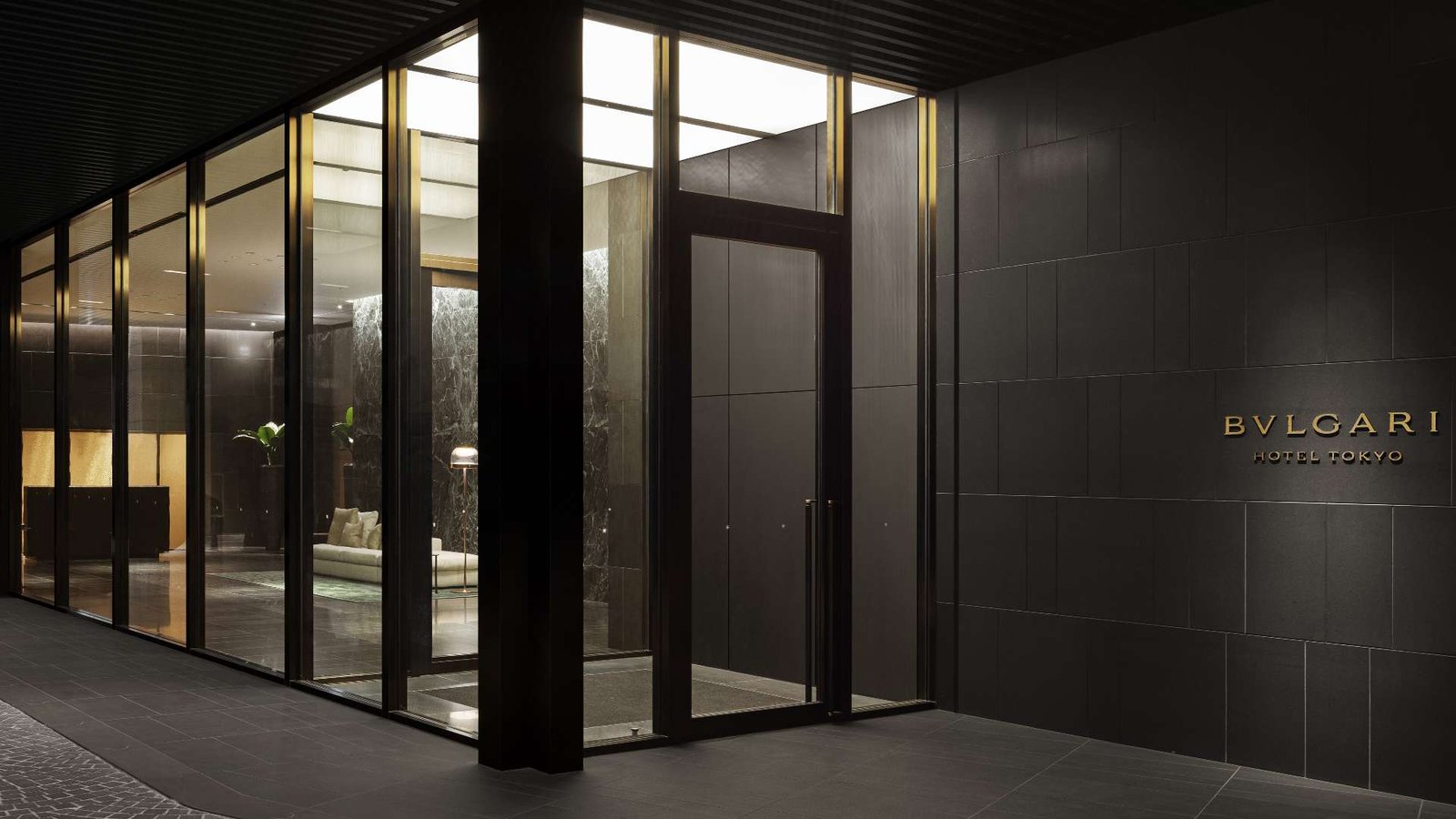 Entrance to Bulgari Hotel Tokyo featuring a modern luxury lobby