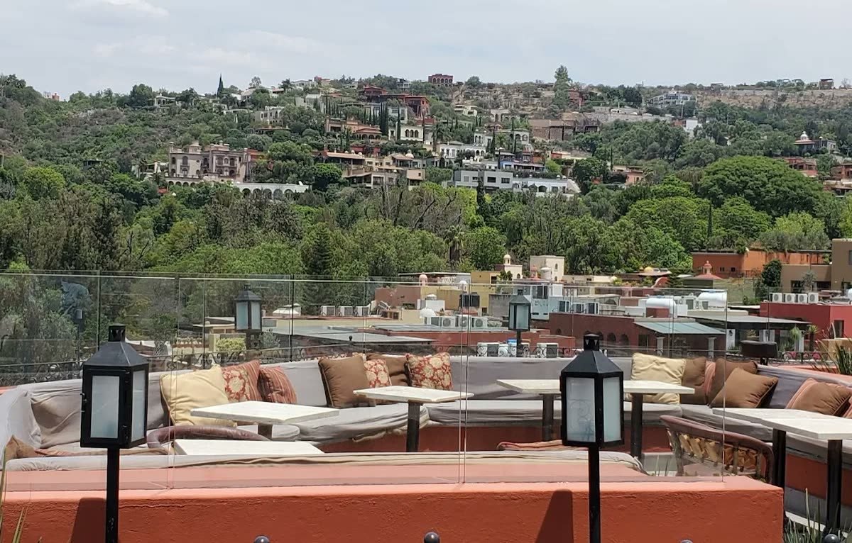 Rooftop terrace lounge in warm evening light