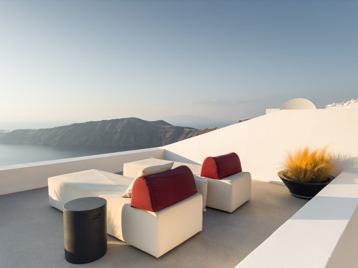 Soft-haze white terrace architecture on a Greek island