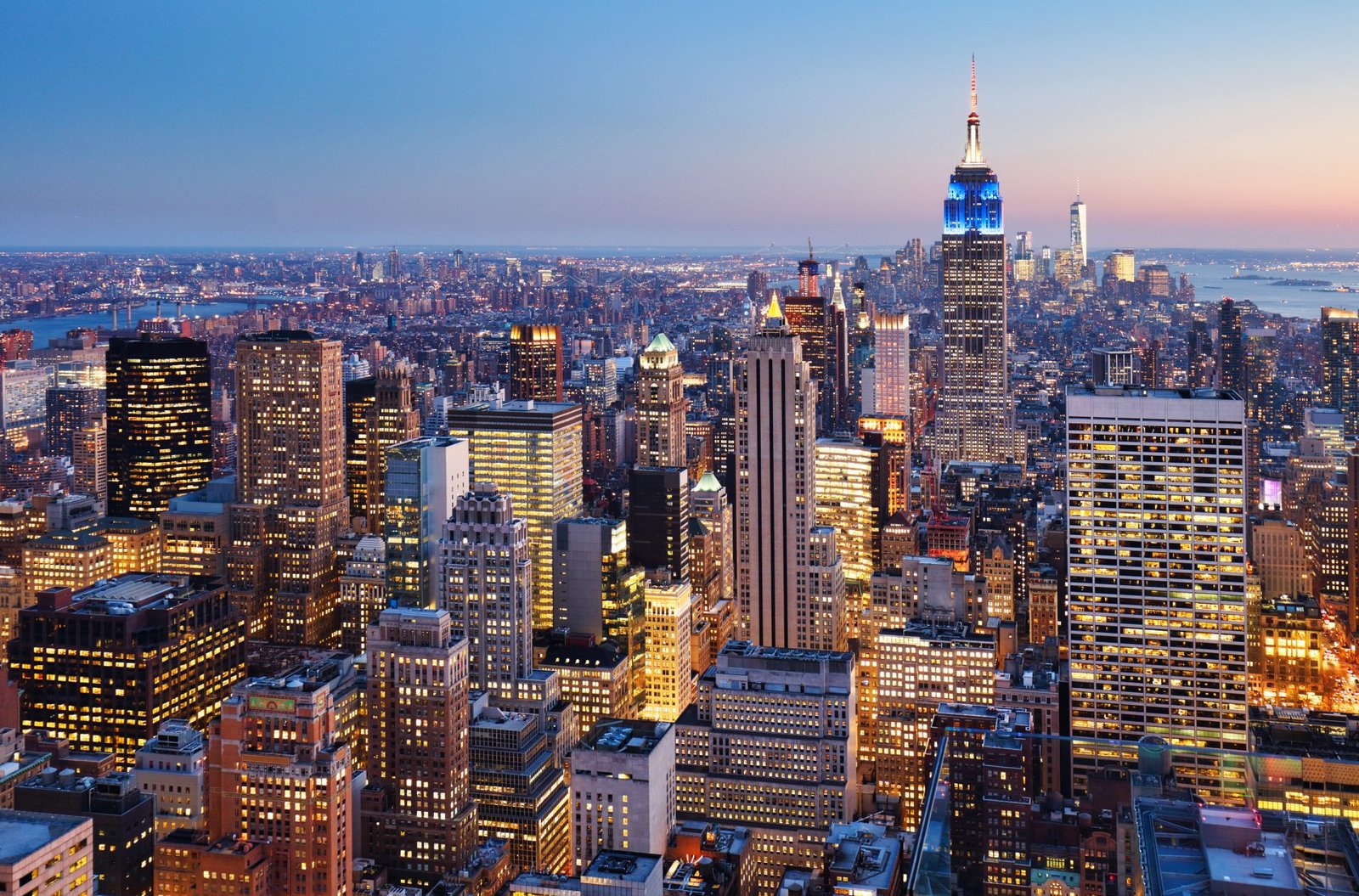 Midtown Manhattan skyline centered on the Empire State Building at dusk