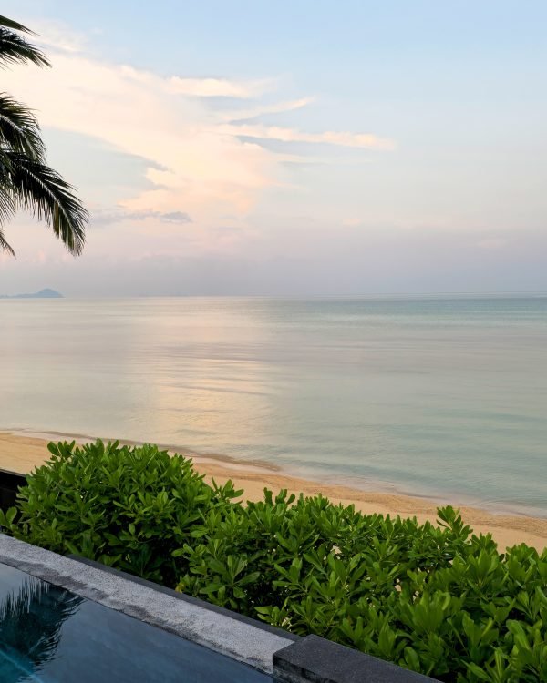 Clifftop plunge pool overlooking a pastel sea