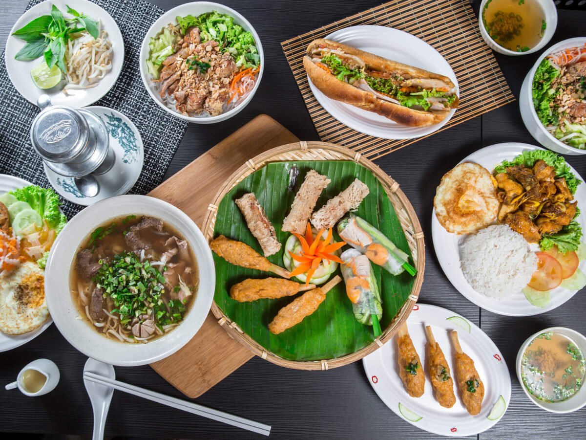 Selection of Michelin-star inspired Vietnamese dishes including pho, banh mi, spring rolls and grilled specialities