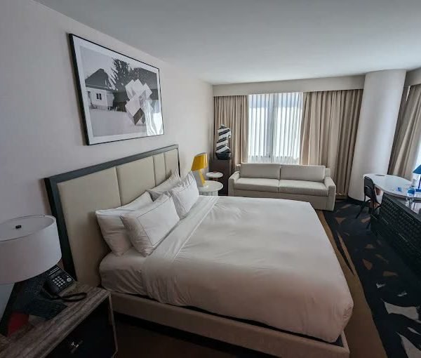 King guest room with monochrome artwork at theWit Chicago
