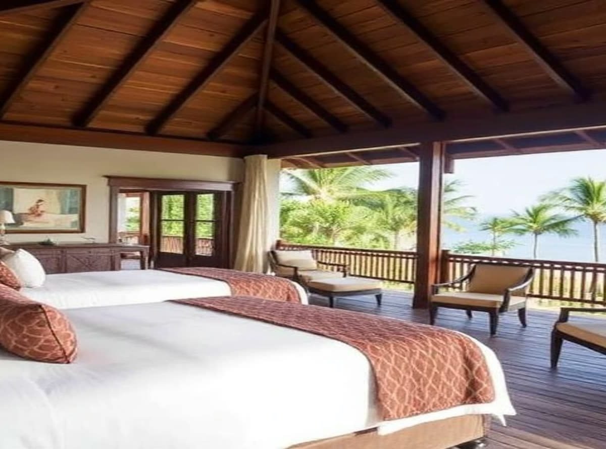 Villa terrace with a daybed overlooking the sea