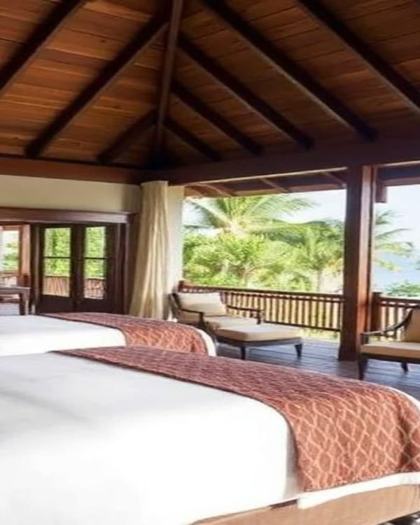Villa terrace with a daybed overlooking the sea