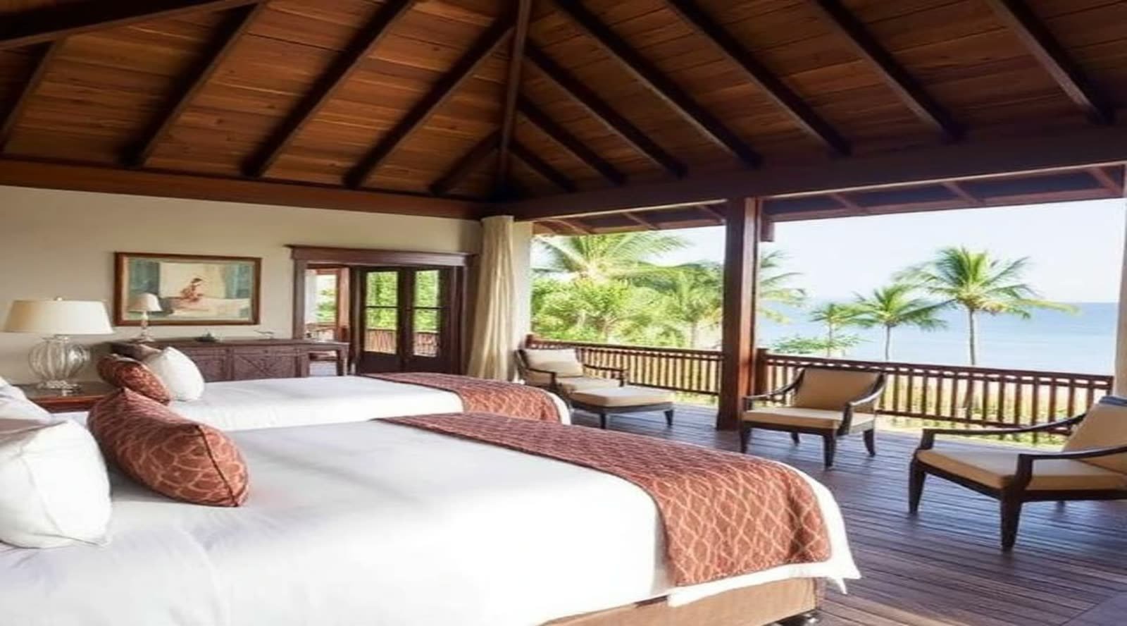 Villa terrace with a daybed overlooking the sea
