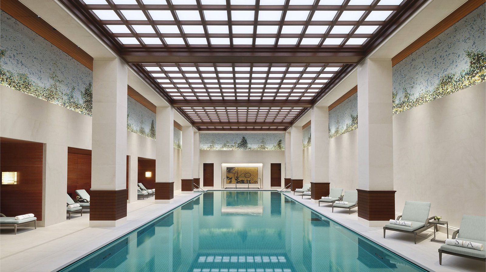 25-meter indoor swimming pool with loungers at The Peninsula Spa in London